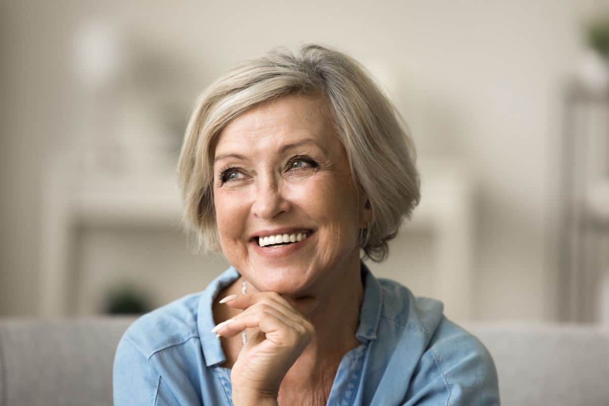 Woman with a healthy, confident smile after root canals for treatment at tuckahoe creek dental in richmond, va.
